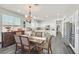 Kitchen and dining area with hardwood floors and chandelier at 10330 Glacier Mist Ave, Las Vegas, NV 89149