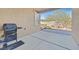 Covered patio with built-in grill and access to backyard at 10330 Glacier Mist Ave, Las Vegas, NV 89149