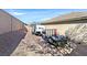 Gravel side yard with RV and trailer parking at 10330 Glacier Mist Ave, Las Vegas, NV 89149