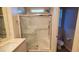 Bathroom with a large walk-in shower and modern fixtures at 11251 Hidden Peak Ave # 212, Las Vegas, NV 89135