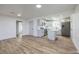 Bright dining area with wood-look floors and an open view to the kitchen at 133 Dogwood St, Henderson, NV 89015