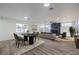 Virtually staged dining area with modern table and chairs at 133 Dogwood St, Henderson, NV 89015