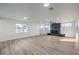 Bright living room with hardwood floors and fireplace at 133 Dogwood St, Henderson, NV 89015