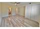 Bright bedroom featuring gray vinyl flooring and ceiling fan at 1405 Vegas Valley Dr # 337, Las Vegas, NV 89169