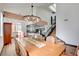 Bright dining room with large table and chandelier at 1717 Imperial Cup Dr, Las Vegas, NV 89117