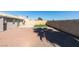 Backyard with gravel, artificial turf, and block wall at 1850 Banaba Ln, Las Vegas, NV 89156