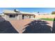 Backyard features artificial turf, gravel, and a view of the house at 1850 Banaba Ln, Las Vegas, NV 89156