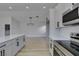 Modern kitchen with stainless steel appliances and gray cabinets at 1850 Banaba Ln, Las Vegas, NV 89156