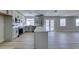 Modern kitchen with island, stainless steel appliances, and white cabinets at 1850 Banaba Ln, Las Vegas, NV 89156