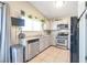 Cozy kitchen featuring stainless steel appliances and granite countertops at 1861 Ridgefield Dr, Las Vegas, NV 89108