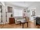 Cozy bedroom with light hardwood floors and a sleeper sofa at 1926 Dresden Ct, Henderson, NV 89014