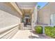 Front entry with wrought iron gate and landscaping at 1926 Dresden Ct, Henderson, NV 89014