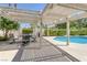 Inviting pool area with pergola and patio furniture at 1926 Dresden Ct, Henderson, NV 89014