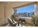 This charming balcony features a seating area and peaceful view of the neighborhood at 1963 Scimitar Dr # 0, Henderson, NV 89014