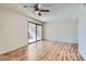 Bedroom with sliding glass doors leading to a balcony and bright natural light at 1963 Scimitar Dr # 0, Henderson, NV 89014