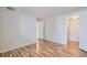 Empty bedroom featuring laminate flooring and several doorways at 1963 Scimitar Dr # 0, Henderson, NV 89014