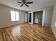 Bedroom featuring wood-look floors, large closet, and ceiling fan at 1963 Scimitar Dr # 0, Henderson, NV 89014