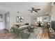 A beautifully staged living room and kitchen featuring a dining area with modern decor and a cozy atmosphere at 1963 Scimitar Dr # 0, Henderson, NV 89014