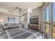 Comfortable bedroom with hardwood floors and city views at 200 Sahara Ave # 1708, Las Vegas, NV 89102