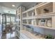 Bright hallway with built-in shelving and storage at 200 Sahara Ave # 1708, Las Vegas, NV 89102