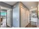 Bright hallway with double doors and built-in shelving at 200 Sahara Ave # 1708, Las Vegas, NV 89102