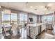 Modern kitchen with island, stainless steel appliances, and city views at 200 Sahara Ave # 1708, Las Vegas, NV 89102