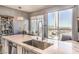 Modern kitchen with marble countertops and city views at 200 Sahara Ave # 1708, Las Vegas, NV 89102