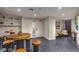 Lobby area with wood tables and chairs, and a modern design at 200 Sahara Ave # 1708, Las Vegas, NV 89102