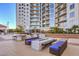 Relaxing patio area with fire pit and seating at 200 Sahara Ave # 1708, Las Vegas, NV 89102