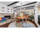 Mid-century modern dining room with stone fireplace and built-ins at 2192 Geronimo Way, Las Vegas, NV 89169