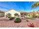 Landscaped backyard with gravel and desert plants at 2373 Rosendale Village Ave, Henderson, NV 89052