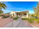 Landscaped backyard with patio and pergola at 2373 Rosendale Village Ave, Henderson, NV 89052