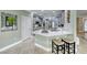 Spacious kitchen with gray cabinets, marble countertops, and stainless steel appliances at 2373 Rosendale Village Ave, Henderson, NV 89052