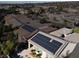 Aerial view of house featuring solar panels, pool, and neighborhood context at 2423 Blair Castle St, Henderson, NV 89044