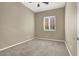 Simple bedroom with neutral walls and carpet flooring at 2423 Blair Castle St, Henderson, NV 89044