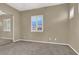 Spacious bedroom with window shutters and plush carpeting at 2423 Blair Castle St, Henderson, NV 89044