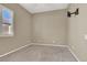 Simple bedroom with neutral walls, carpet, and a window at 2423 Blair Castle St, Henderson, NV 89044