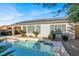 Inviting pool with solar panels on the house at 2423 Blair Castle St, Henderson, NV 89044