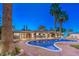 Inviting backyard with a refreshing pool, patio, and lush landscaping at 2505 Laurie Dr, Las Vegas, NV 89102