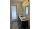 Bathroom boasts double sinks and modern finishes at 2505 Laurie Dr, Las Vegas, NV 89102