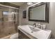 Bathroom boasts a walk-in shower, modern vanity, and updated fixtures at 2505 Laurie Dr, Las Vegas, NV 89102