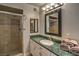 Clean bathroom, featuring a walk-in shower and green marble vanity at 2505 Laurie Dr, Las Vegas, NV 89102