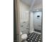 Updated bathroom featuring a shower and black and white tile floor at 2505 Laurie Dr, Las Vegas, NV 89102