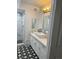 Modern bathroom with marble shower and stylish tile floor at 2505 Laurie Dr, Las Vegas, NV 89102