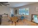 Charming dining room with a round table and four chairs, featuring a decorative tablecloth at 2505 Laurie Dr, Las Vegas, NV 89102