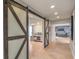 Hallway with barn door leading to an office at 2505 Laurie Dr, Las Vegas, NV 89102