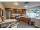 Modern kitchen with stainless steel appliances and tile flooring at 2505 Laurie Dr, Las Vegas, NV 89102