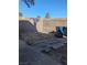 Small backyard with a concrete patio and block wall at 2567 Paradise Village Way, Las Vegas, NV 89120