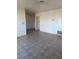 Empty living room with tile floors at 2567 Paradise Village Way, Las Vegas, NV 89120