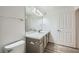 Modern bathroom with double vanity and gray cabinets at 2900 Sunridge Heights Pkwy # 1514, Henderson, NV 89052